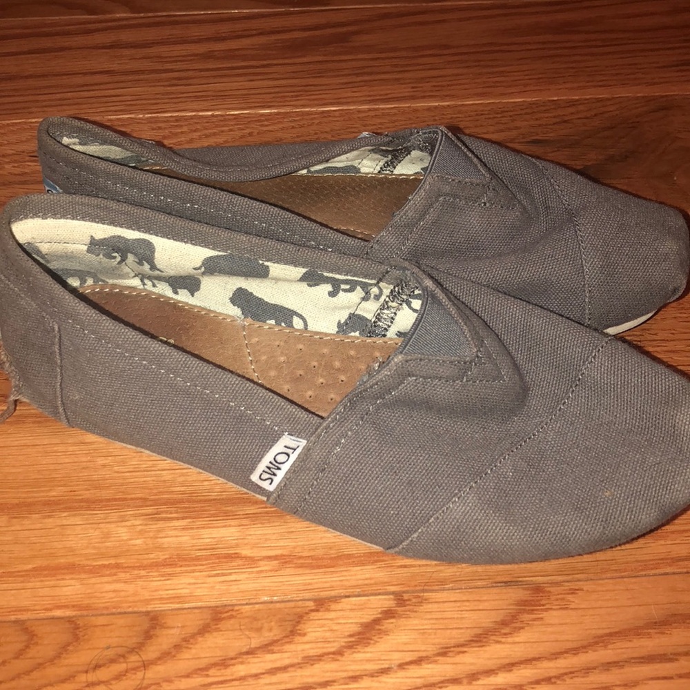 Toms gray shoes.